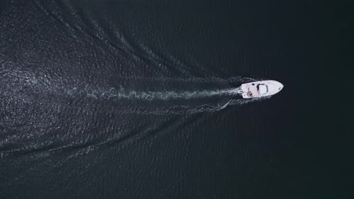Aerial View of Speed Motor Boat on Open Sea at Summer Day