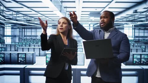 Coworkers in Data Center Doing Brainstorming Fixing Errors