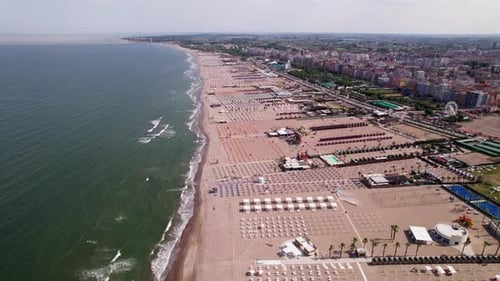 Aerial High Angle View Of A Beautiful Sunlit Beach Resort