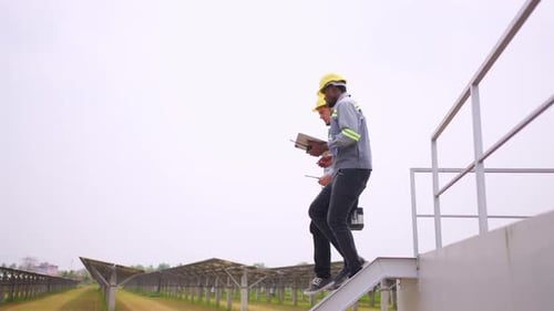 Professional engineer work to maintenance of photovoltaic panel system.