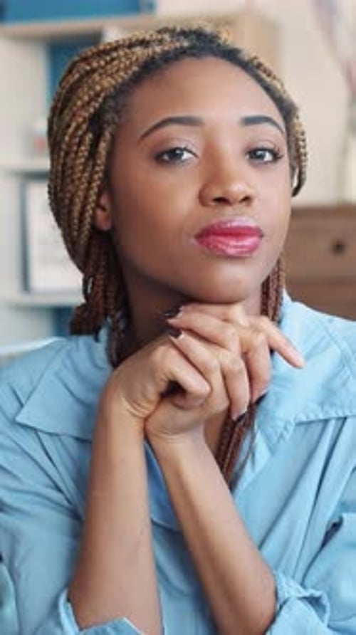 Beautiful Woman with Blonde Braids Smiling
