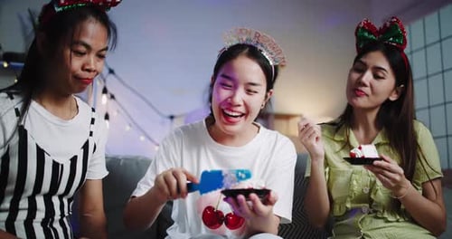 Friends Celebrate Birthday with Cake at Home