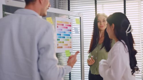 Group of Asian businessman and businesswoman working in the office.
