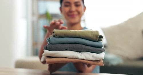 Laundry, clothing and woman with pile of washing, smile and finished household chores