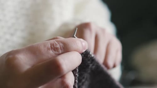 Hands Knitting Gray Wool Garment Close Up
