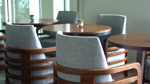 Cozy Restaurant Seating with Round Tables and Chairs