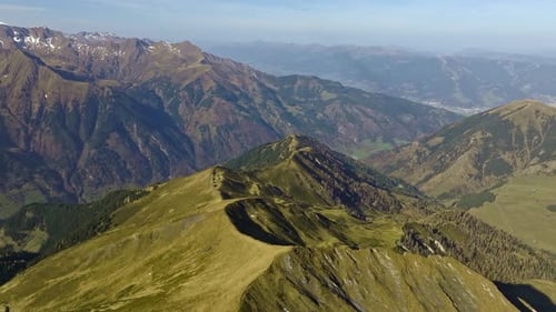 Aerial View Of Green Mountains And Rugged Ridges In Kreuzkopf, Austria