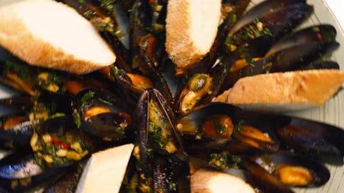 Delicious Fresh Mussels Set is Served on a Salver Large Plate for Luxury Restaurant Visitors