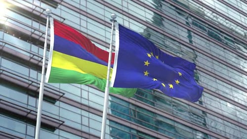 Mauritius and European Union Flags Waving Against Modern Building