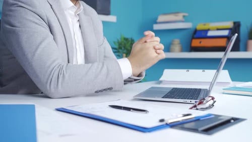Businessman with panic and fear overwhelmed in office.
