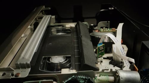 VHS PLAYER Old Video Recorder Inside Closeup VHS Retro Player in Neon Blue Light Vintage Video