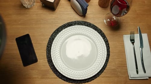 Waiter putting plate dinner food in fancy italian restaurant pov dining delicious