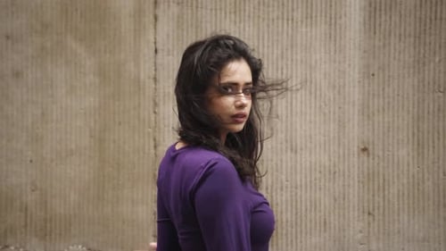 Woman Posing Elegantly in the City