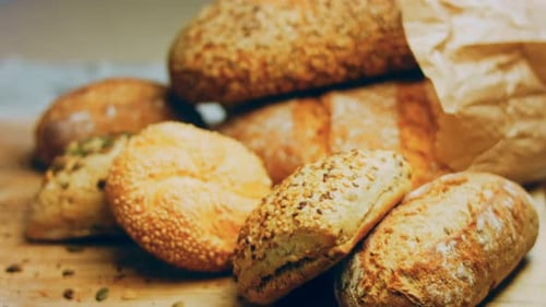 Variety of Breads on a Wooden Cutting Board