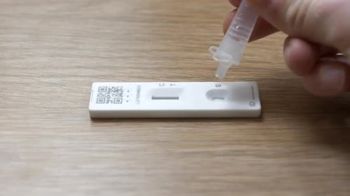 Performing COVID-19 Rapid Antigen Test Close Up