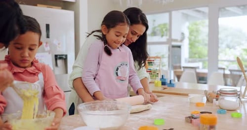 Family Baking Together in Bright Kitchen