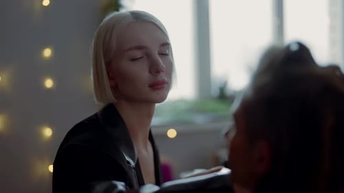 Gay Makeup Artist Works in Salon or Backstage of Beauty Show Androgynous Person Applying Foundation