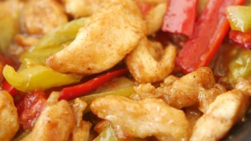 Seasoned Chicken Breast with Colorful Stir Fried Peppers