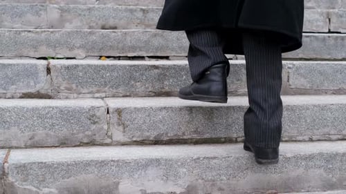 An Old Man with a Stick in His Hands Climbs the Stairs to the Top Difficulty Walking in Old Age