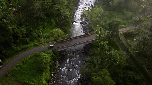 Aerial view of bridge over river, Indonesia.