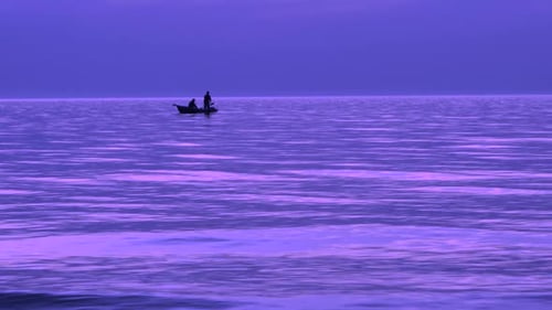 Baltic coast and purple sunset, two fishermen on boat, slow motion