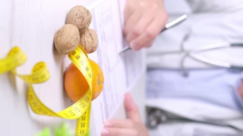 Vertical video of Nutritionist doctor giving a diet prescription, Healthy food concept
