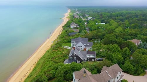 Cape Cod Beach Houses, Sandy Shoreline, and Cloudy Atlantic Horizon