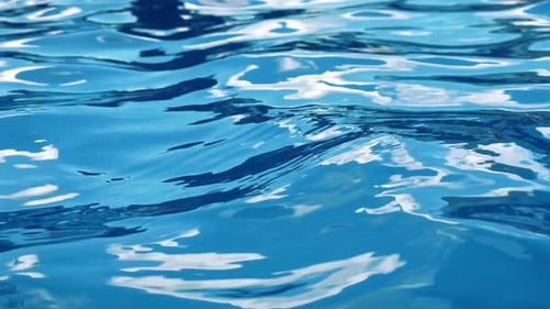 Rippling Blue Water Surface Reflecting the Sun