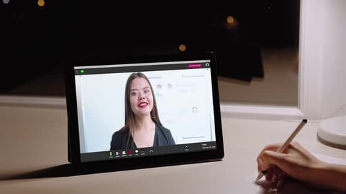Woman on Tablet Presenting Online, Person Taking Notes