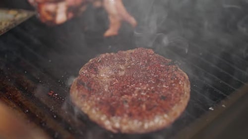 Fast Food the Process of Cooking a Burger on the Grill Meat Cutlets are Grilled Baking Slices of