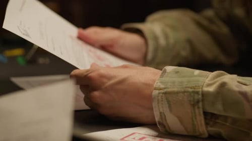 Person Reviews Top Secret Classified Documents