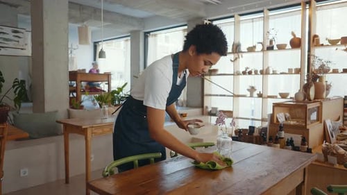 Employees working in a nordic styled cafe.