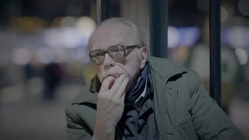 Elderly Homeless Man Suffering From Poverty Looking for Help at Train Station