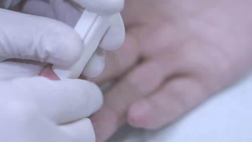 Blood test from a finger. Close up.