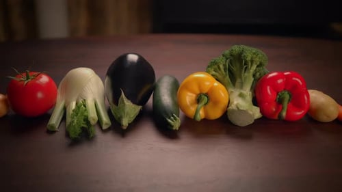 A Colorful Variety of Fresh and Vibrant Vegetables Displayed on a Wooden Table Surface