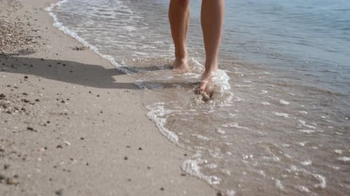 Closeup Beautiful Woman Legs Walking Wet Sand Near Calm Ocean Waves. Unknown