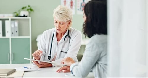 Woman, doctor and consulting patient with tablet for prescription, diagnosis or results at clinic