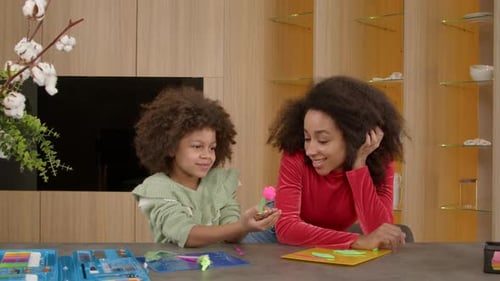 Mother and Daughter Make Clay Flowers Together