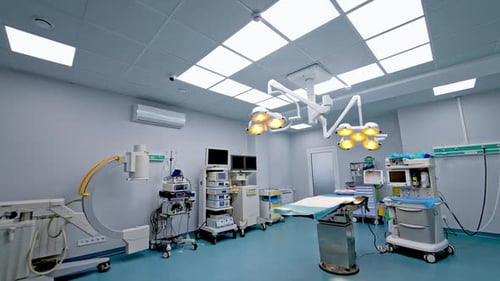 Empty surgery theatre with varied equipment used at modern surgeries.