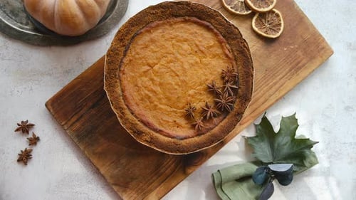 Pumpkin Pie Garnished with Anise Top View