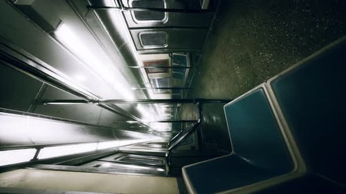 Vertical Empty Metal Subway Train in Urban Chicago