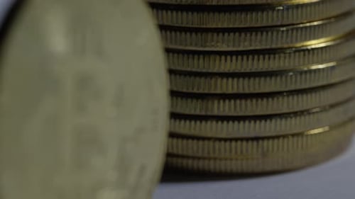 Crypto Currency - Physical bitcoin currency on white