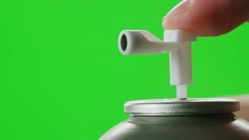 Man Applying Air Freshener Deodorant Spray for Bathroom Chroma Key Green Screen Closeup