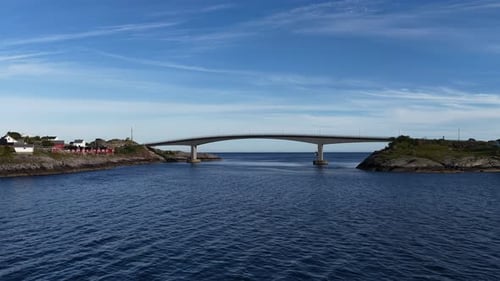Aerial View of Bridge Connecting Islands in Norway Under Blue Sky