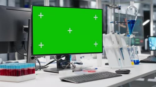 Laboratory Setup with Green Screen Monitor for Research