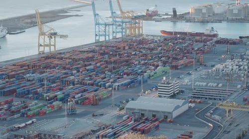 Industrial Port of Barcelona with Ships Cargo Containers and Loading Cranes