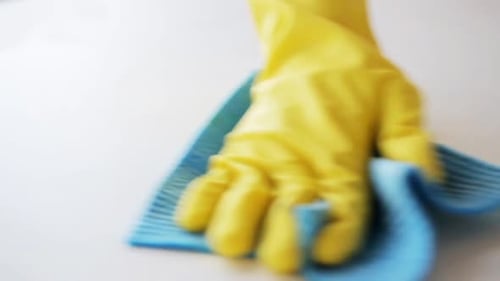 Cleaning a Coffee Stain with Spray and Cloth