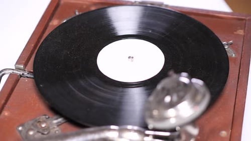Vintage Gramophone Playing a Vinyl Record Nostalgia and Music History