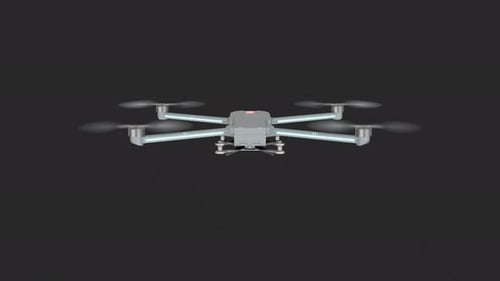 Modern Quadcopter Drone Flying with Rotating Propellers