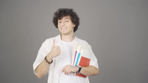 Young Adult Giving Thumbs Up